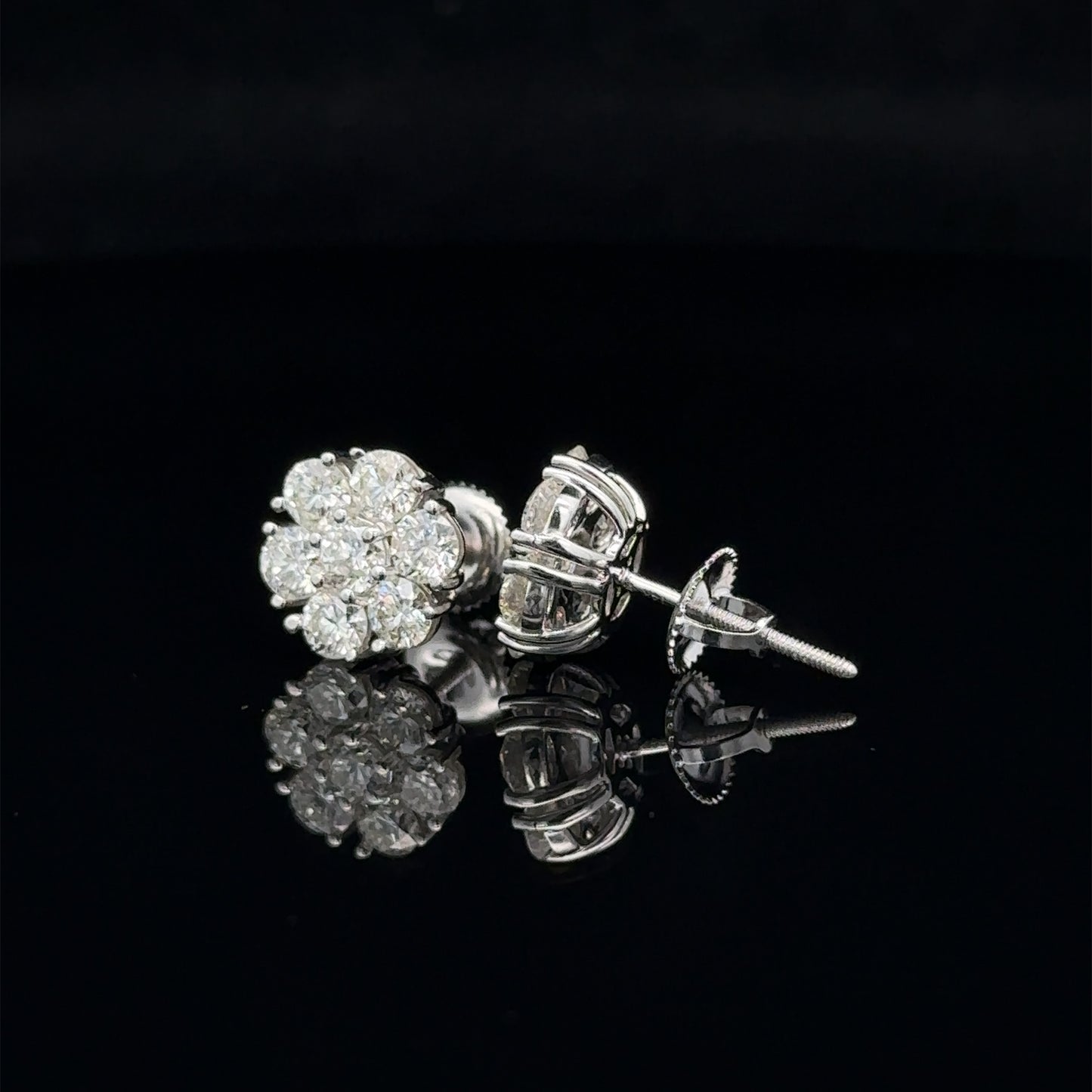 14k white gold and diamond flower Earrings (14 pointer)