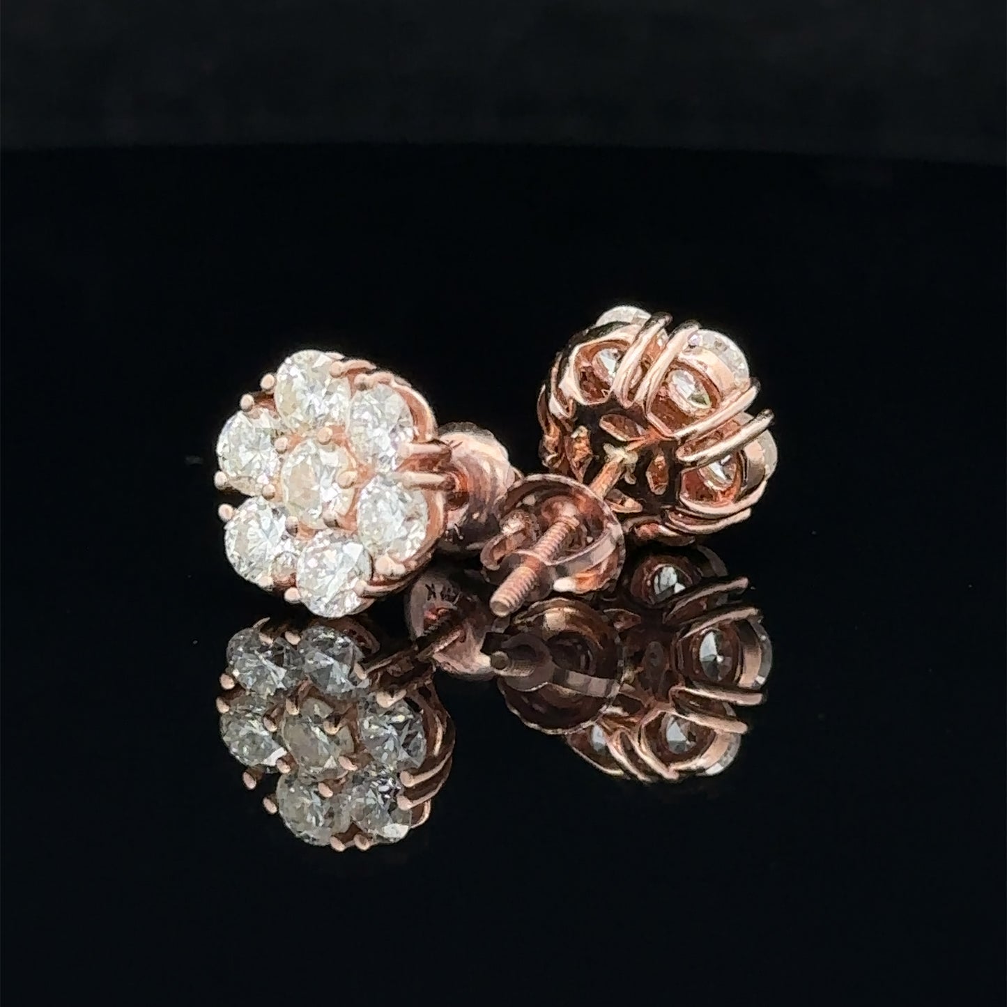 14k rose gold and diamond flower Earrings (15 pointer)