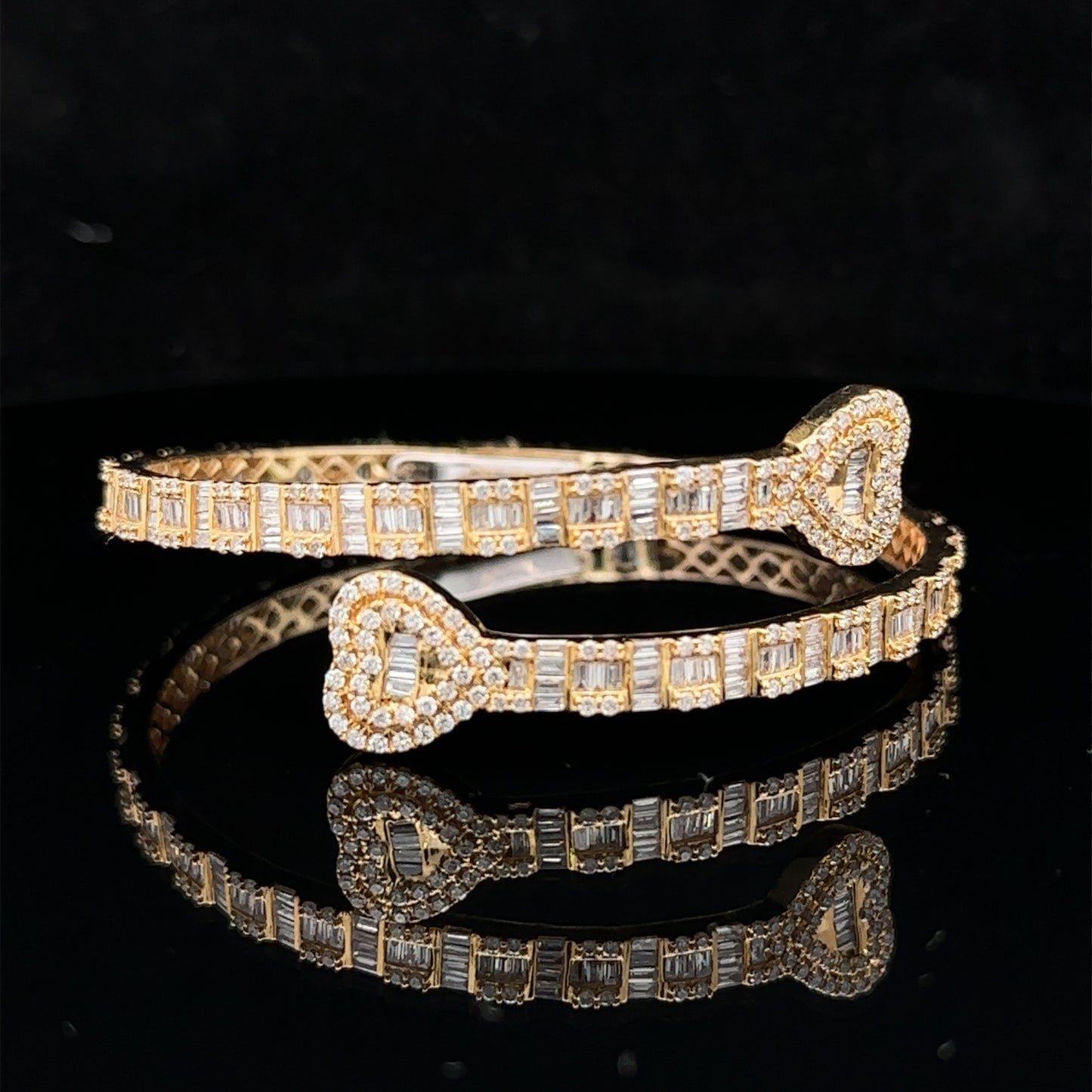 14k yellow gold and diamond twin heart bangle