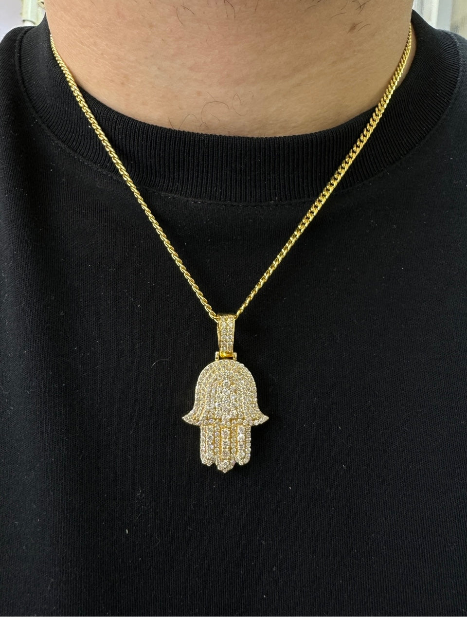 14k yellow gold and diamond Hamsa pendant and 14k yellow gold cuban link chain