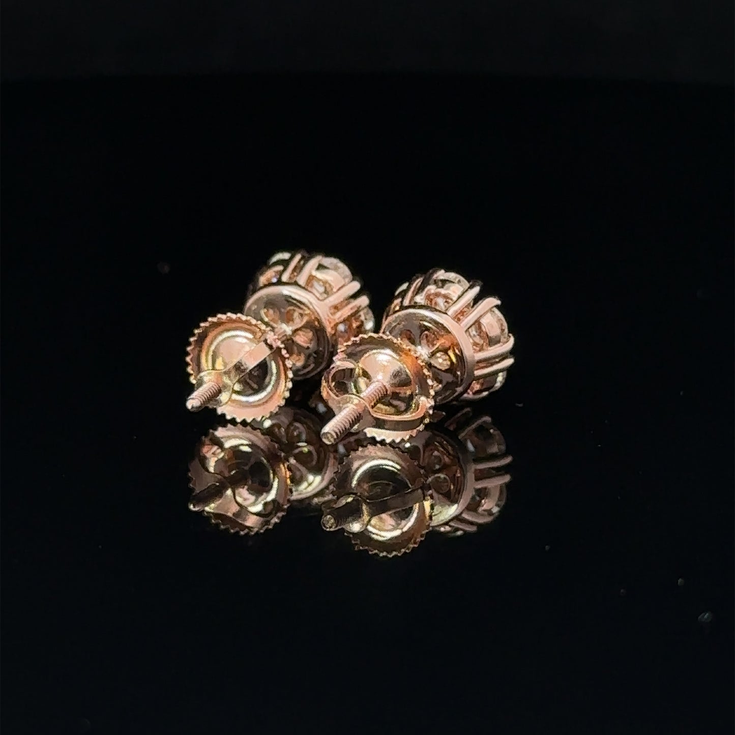 14k rose gold and diamond Flower Earrings (7 pointer)