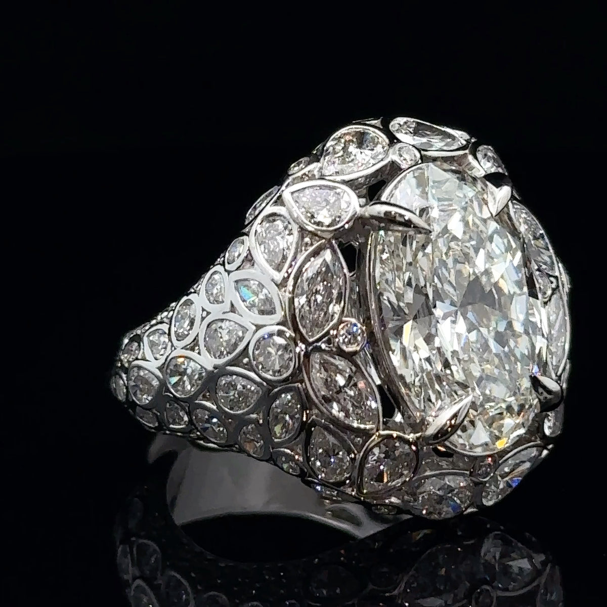 White Gold and Fancy Cut Diamond Ring With Oval Center