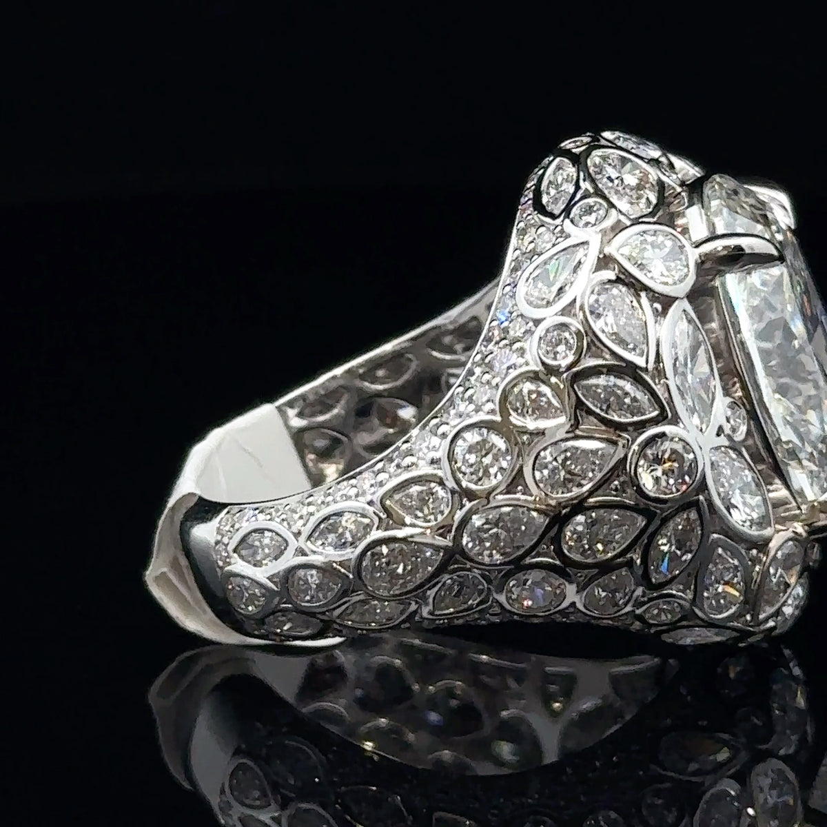 White Gold and Fancy Cut Diamond Ring With Oval Center